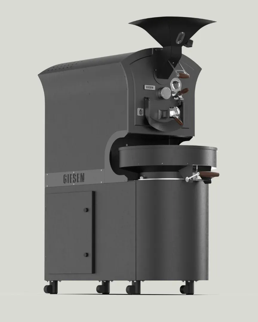 The Giesen15-E: a dark grey drum roaster with hopper, cooling tray and trier